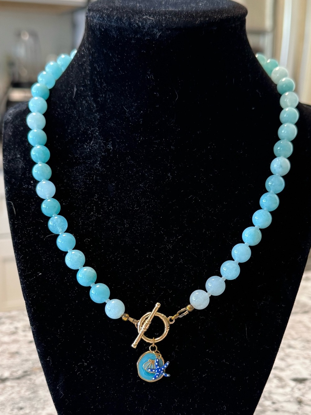 Sea Glass Beaded Necklace with Gold Toggle and Blue seashell starfish Charm